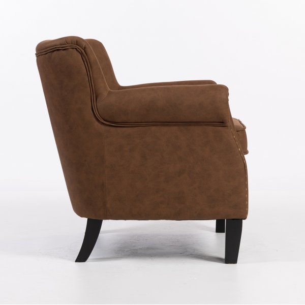 Norberg-nojatuoli ruskeana vintage-tyyliin Norberg-nojatuoli ruskeana vintage-tyyliin