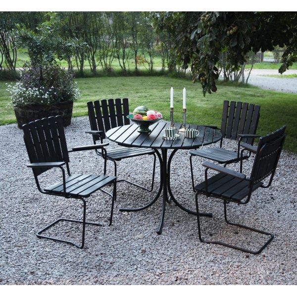 Ruokailuryhmä Vaxholm jousiteräksestä (valmistettu Euroopassa) mustaa puuta, musta runko + Huonekalujen tekstiilien hoito Ruokailuryhmä Vaxholm jousiteräksestä (valmistettu Euroopassa) mustaa puuta, musta runko + Huonekalujen tekstiilien hoito